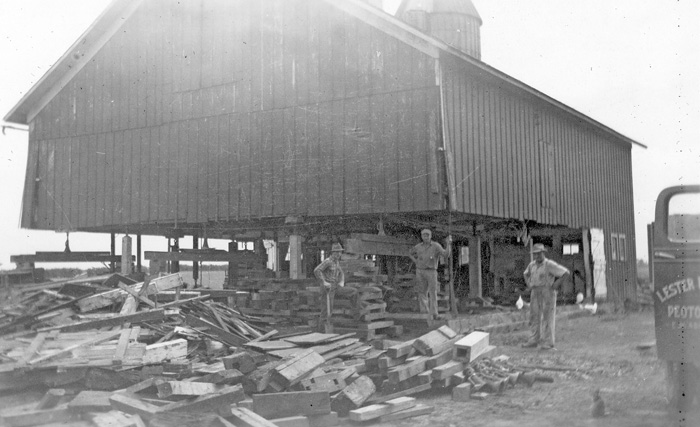 Community work - rebuilding Lester Schroeder’s barn.