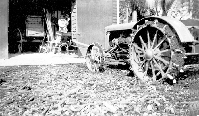 Walter grinding corn for feed for the animals